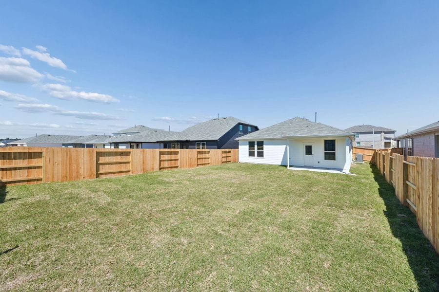 Exterior details and patio area of a home in Mavera, Conroe (Image 3).