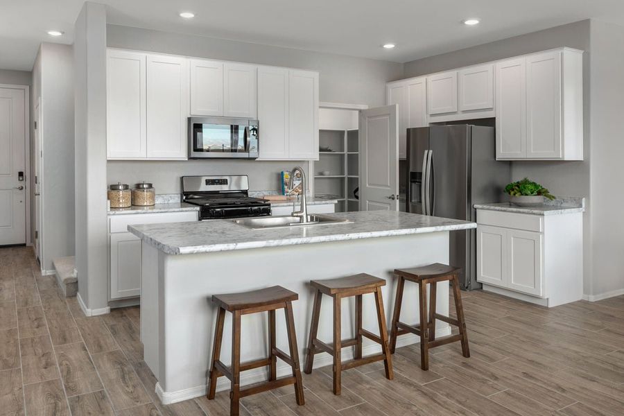 Representative furnished interior of a home built from the Plan 1768 Modeled by KB Home in Founders Ridge, Vail (Image 6).