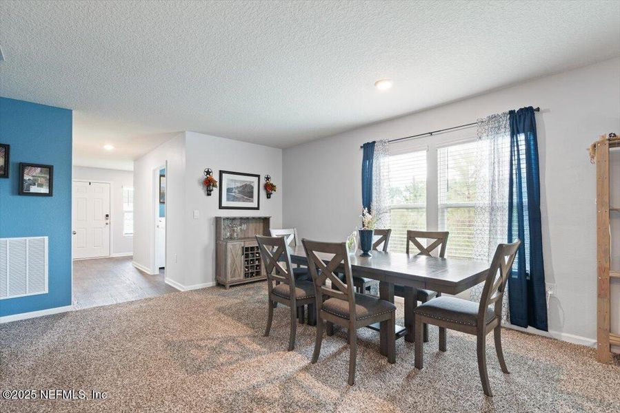 Furnished interior view inside a new home in River Glen Express, Yulee (Image 4).