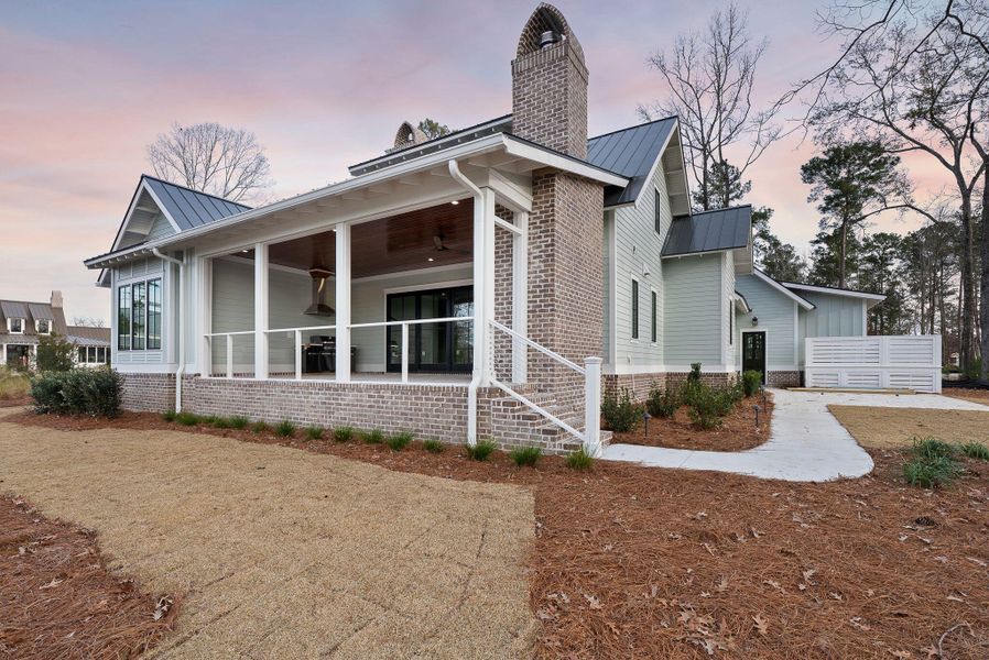 Exterior details and patio area of a home in , Ravenel (Image 3).