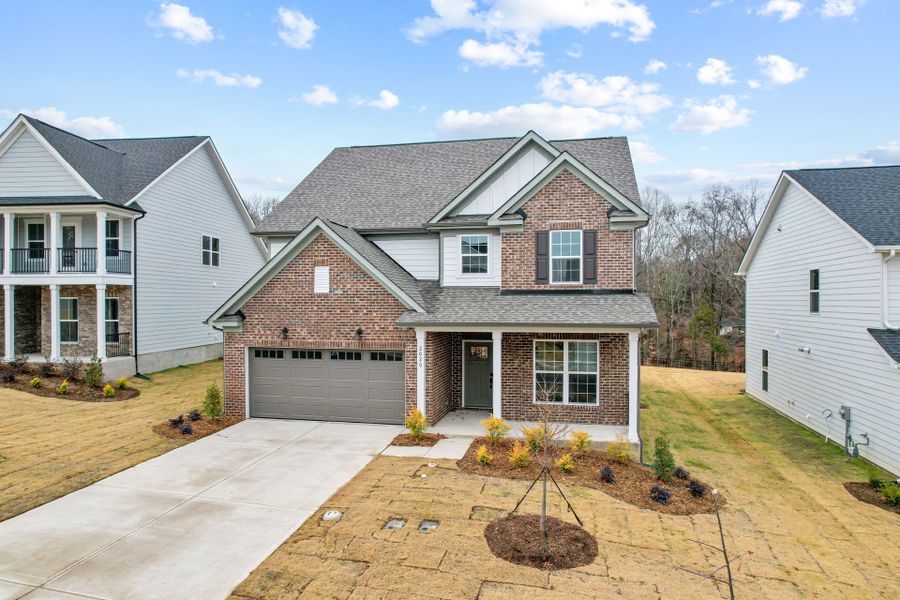 Front exterior of a new home in Forest Creek, Waxhaw, NC, highlighting curb appeal (Image 33).