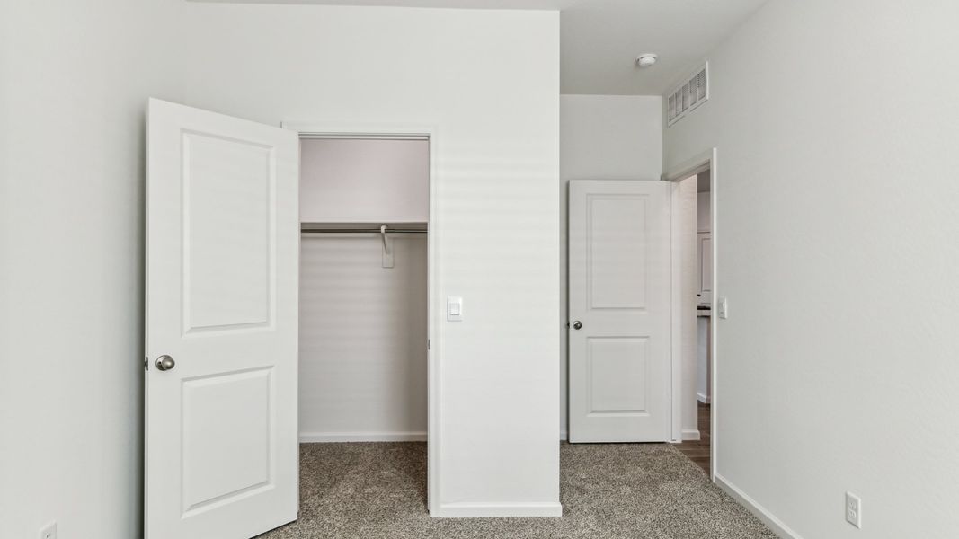 Spacious, unfurnished interior of a new home in Copper Falls, Buckeye (Image 13).