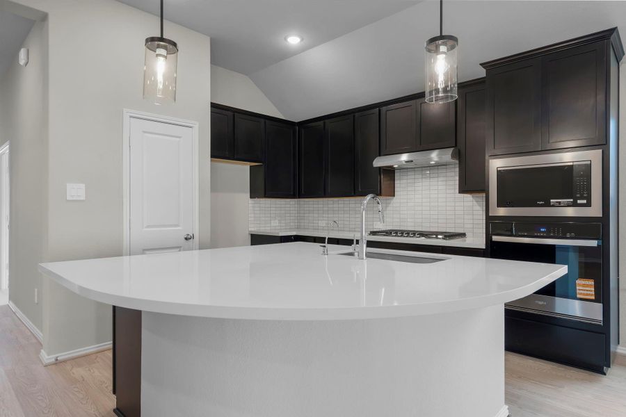 Furnished interior view inside a new home in The Highlands 45', Porter (Image 12).