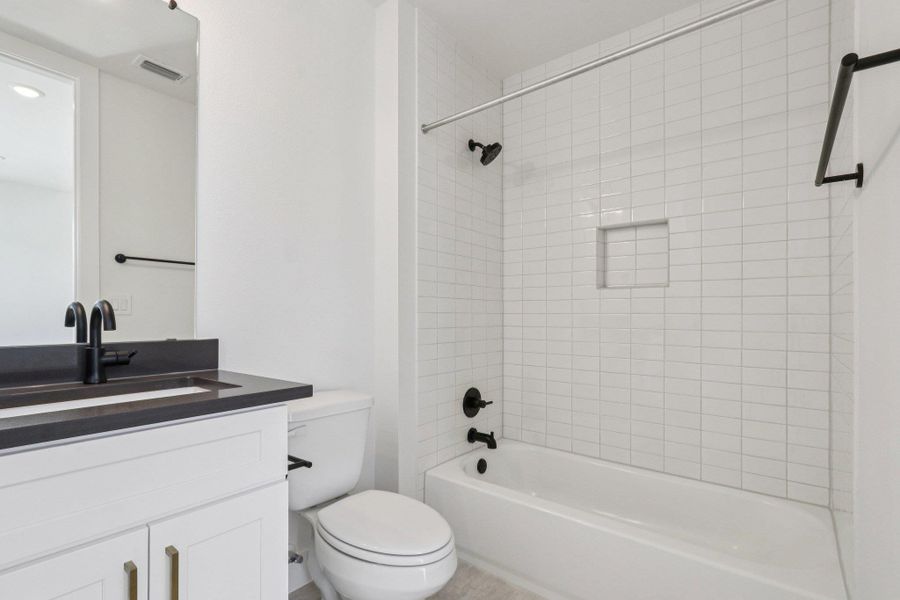 Furnished interior view inside a new home in The Grove, Austin (Image 7). Furnished interior view inside a new home in The Grove, Austin (Image 7).