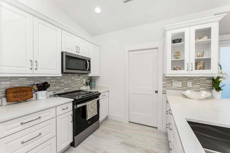 Furnished interior view inside a new home in , Port Charlotte (Image 12).