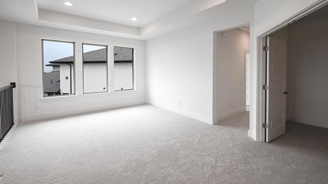 Spacious, unfurnished interior of a new home in 6 Creeks, Kyle (Image 8).