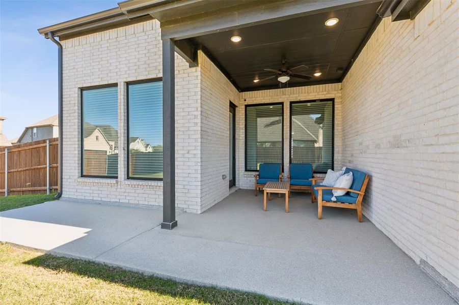 View of patio / terrace with an outdoor living space and ceiling fan