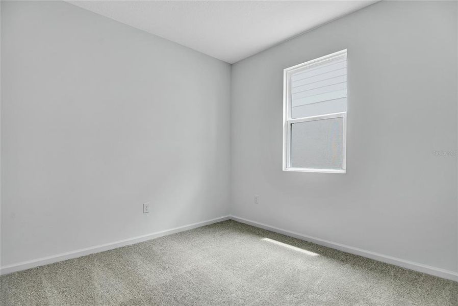 Spacious, unfurnished interior of a new home in Seasons at Shores of Lake Dell, Dundee (Image 14).