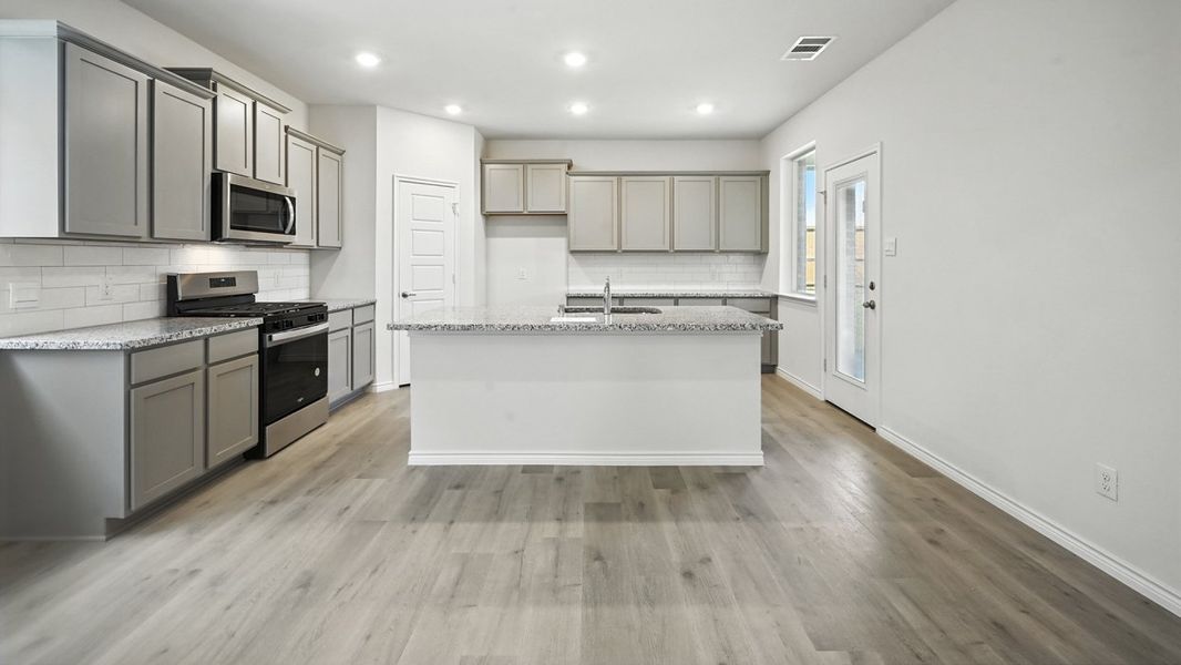 Furnished interior view inside a new home in Winchester Crossing, Princeton (Image 3).