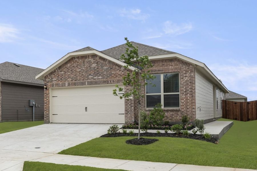 Representative exterior photo of a completed home built from the Hickory by Impression Homes in Creekside Ranch, Blue Ridge, TX (Image 2).