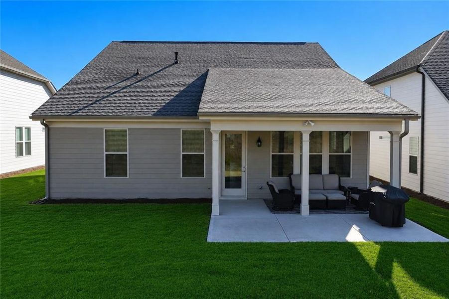 Exterior details and patio area of a home in , Hoschton (Image 26).