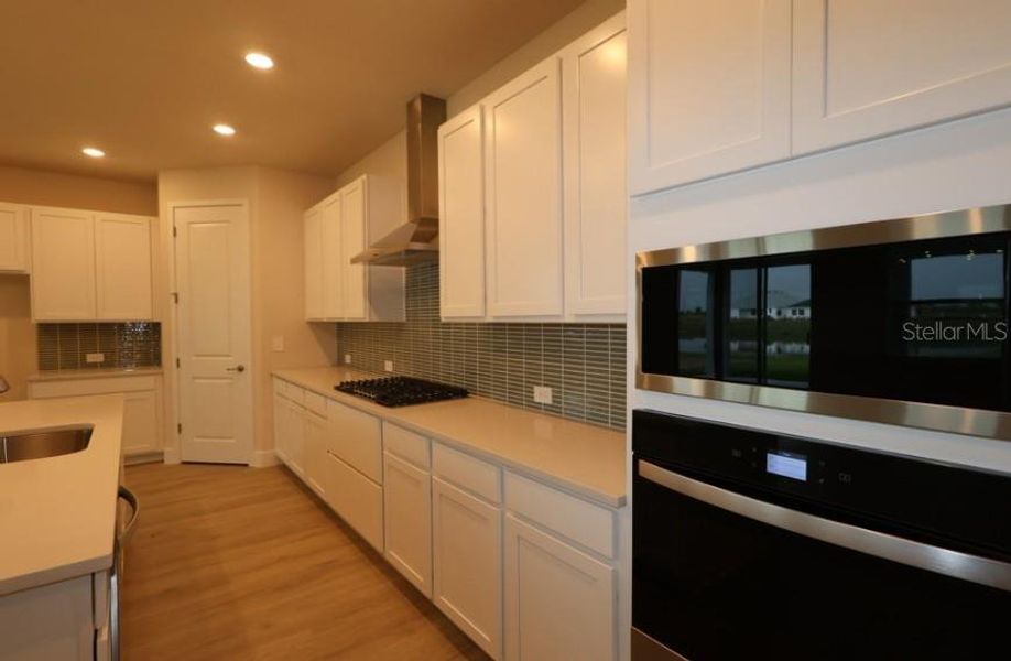 Furnished interior view inside a new home in Coasterra, Palmetto (Image 8).