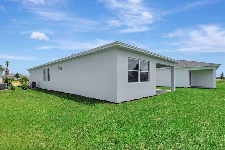 Exterior details and patio area of a home in Cresswind at Lake Harris, Tavares (Image 35).