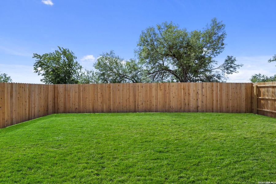 Exterior details and patio area of a home in Guadalupe Ridge, New Braunfels (Image 2).