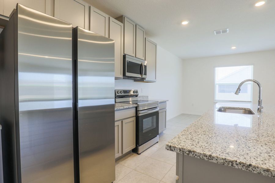 Representative furnished interior of a home built from the Springfield by Maronda Homes in Hontoon Reserve, Deland (Image 5).
