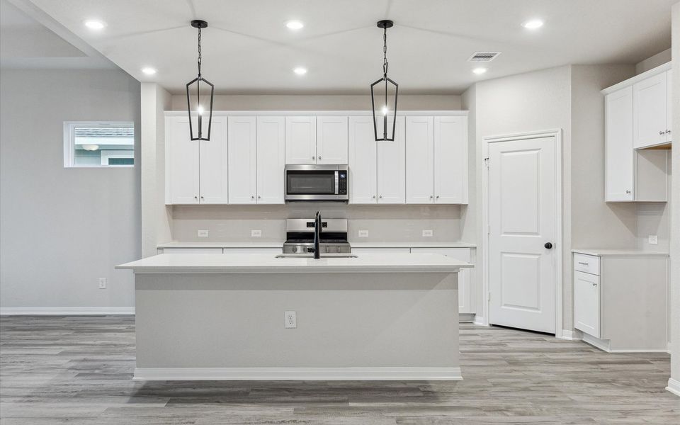 Furnished interior view inside a new home in Elyson, Katy (Image 9).