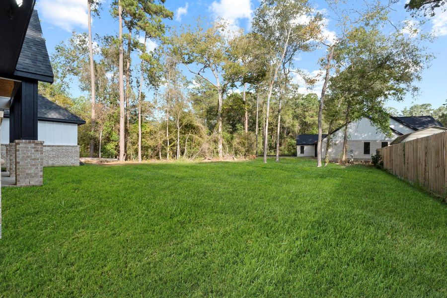 Exterior details and patio area of a home in , New Caney (Image 4).