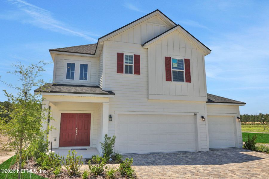 Front exterior of a new home in Brook Forest, St. Augustine, FL, highlighting curb appeal (Image 26).
