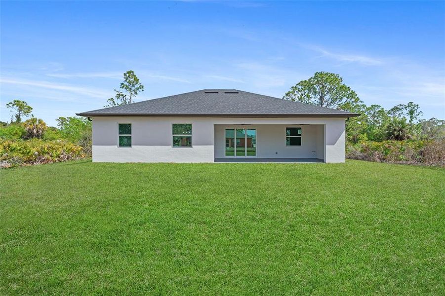 Exterior details and patio area of a home in , North Port (Image 21).