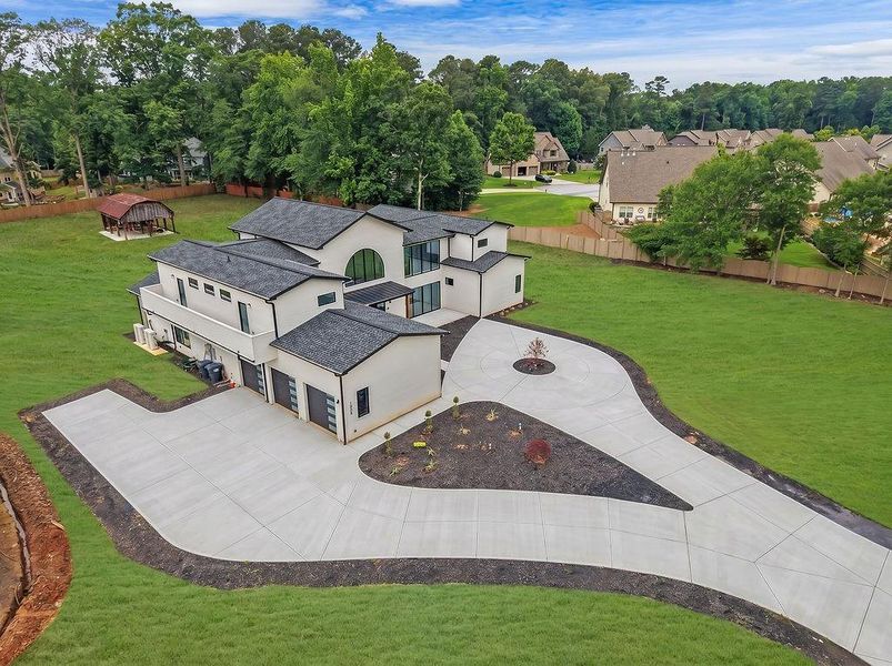 Front exterior of a new home in , Marietta, GA, highlighting curb appeal (Image 27).