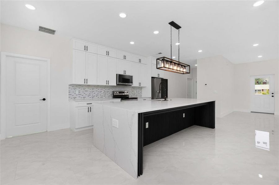 Furnished interior view inside a new home in , Port Charlotte (Image 39).