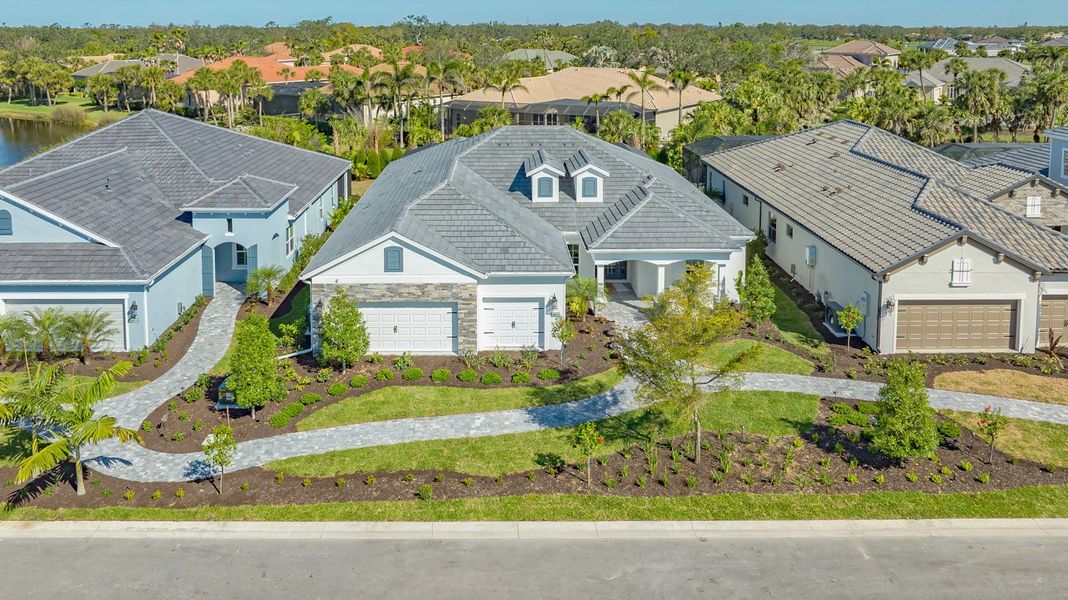 Representative exterior photo of a completed home built from the Captiva by Neal Communities in Boca Royale Golf & Country Club at Wellen Park, Englewood, FL (Image 21).