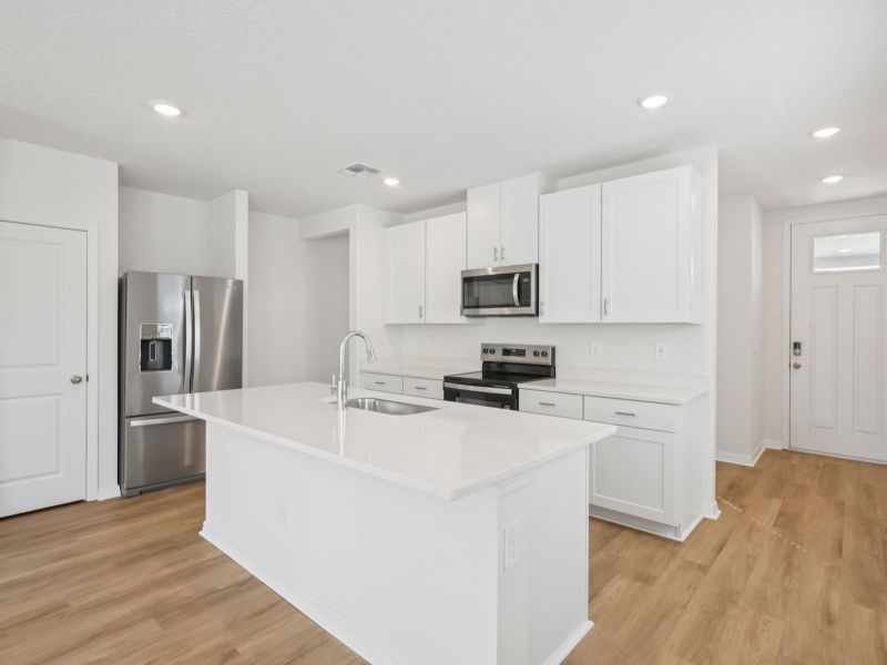 Furnished interior view inside a new home in Oakfield Trails - Premier Series, Parrish (Image 4).