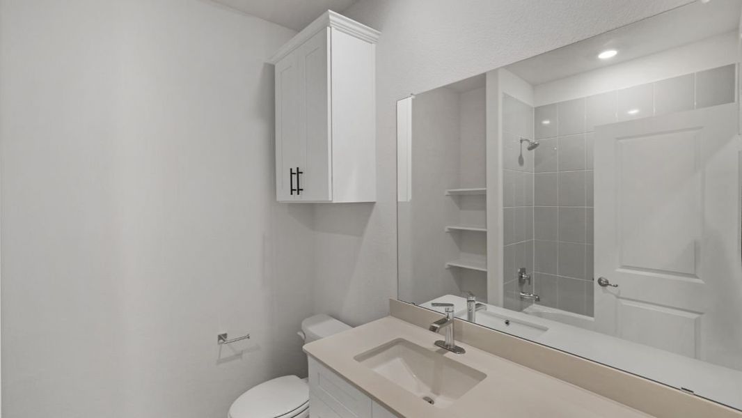 Representative furnished interior of a home built from the Appaloosa by D.R. Horton in The Avenue, Allen (Image 9).