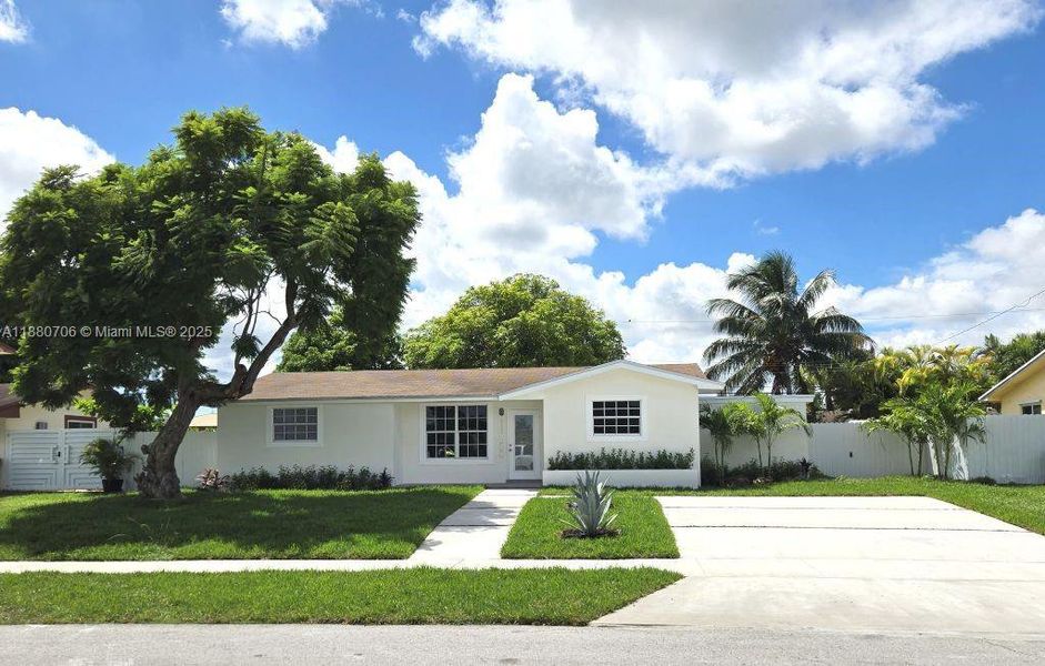 Front exterior of a new home in , Miami, FL, highlighting curb appeal (Image 27). Front exterior of a new home in , Miami, FL, highlighting curb appeal (Image 27).