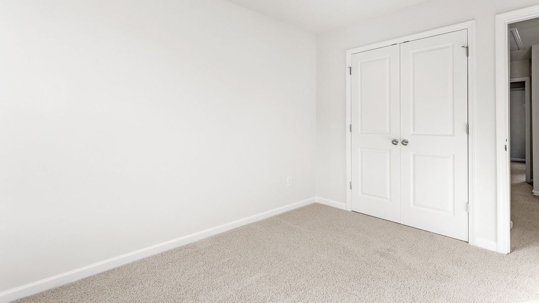 Representative unfurnished interior of a home built from the NEWTON - EXPRESS by D.R. Horton in Glennview, Kernersville (Image 15).