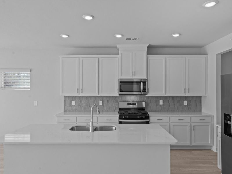 Furnished interior view inside a new home in The Farm at Wells Creek - Signature Collection, Gray Court (Image 3).