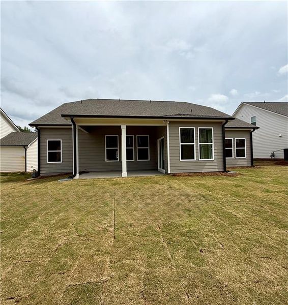 Exterior details and patio area of a home in Ponderosa Farms Reserve, Gainesville (Image 28).