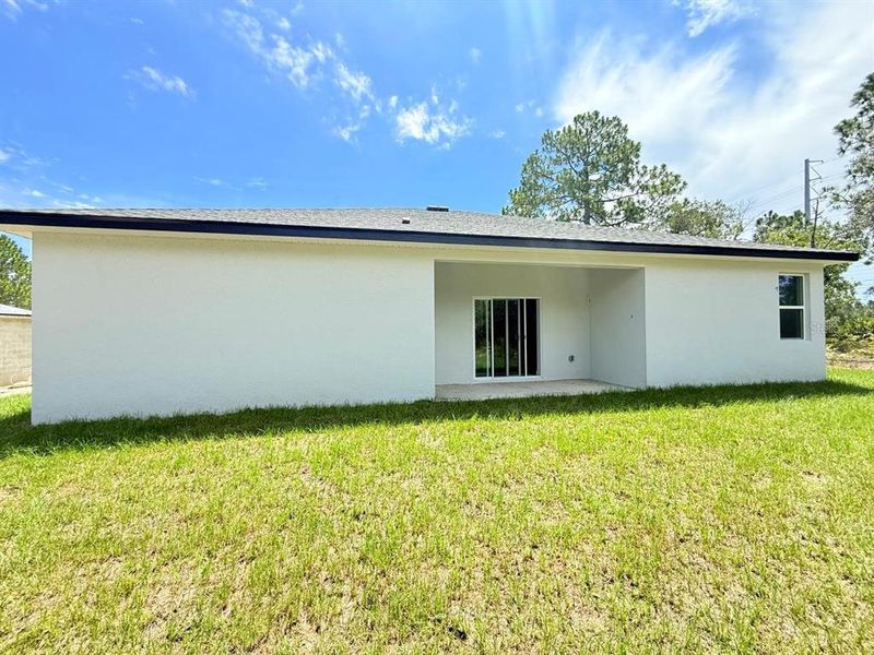 Front exterior of a new home in , Citrus Springs, FL, highlighting curb appeal (Image 16). Front exterior of a new home in , Citrus Springs, FL, highlighting curb appeal (Image 16).