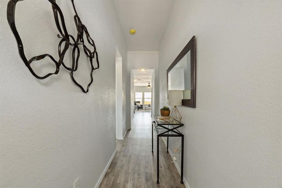 Corridor featuring hardwood / wood-style floors