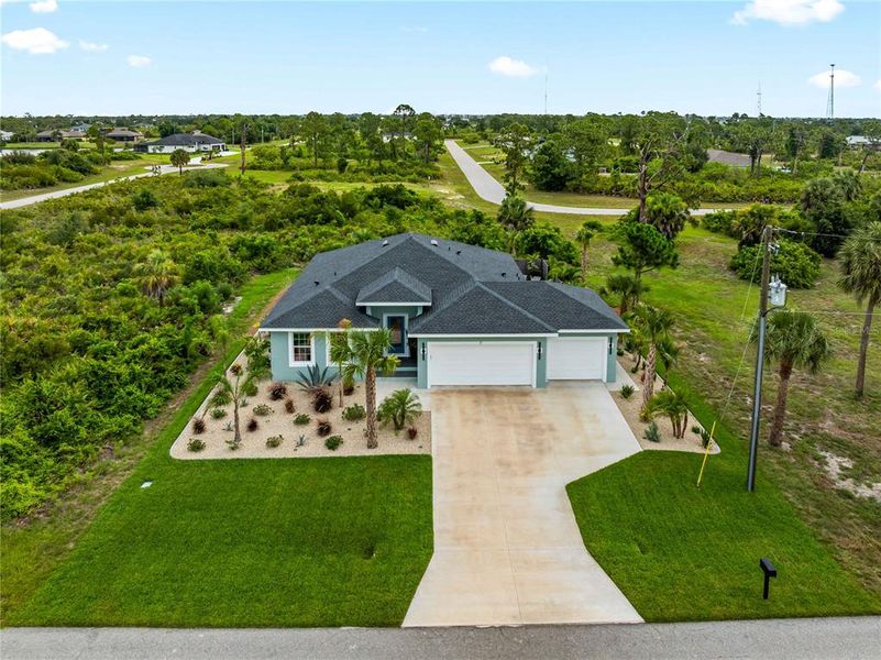 Front exterior of a new home in , Placida, FL, highlighting curb appeal (Image 27).