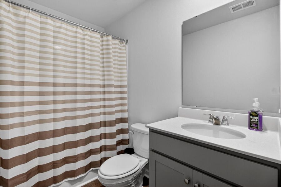 Furnished interior view inside a new home in Back River Bend, Goose Creek (Image 9).