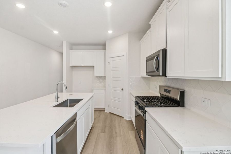 Furnished interior view inside a new home in Comanche Ridge, San Antonio (Image 5). Furnished interior view inside a new home in Comanche Ridge, San Antonio (Image 5).