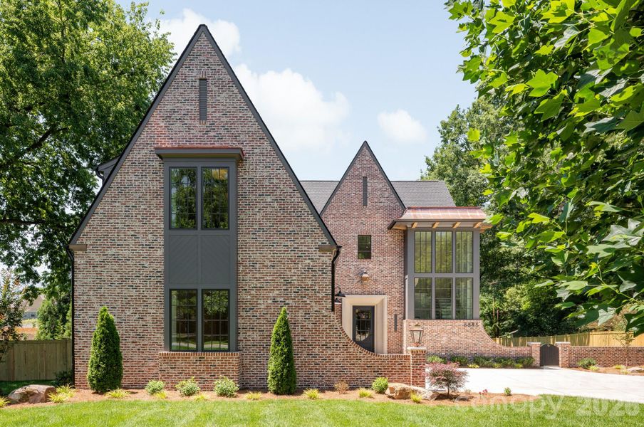 Front exterior of a new home in , Charlotte, NC, highlighting curb appeal (Image 27).