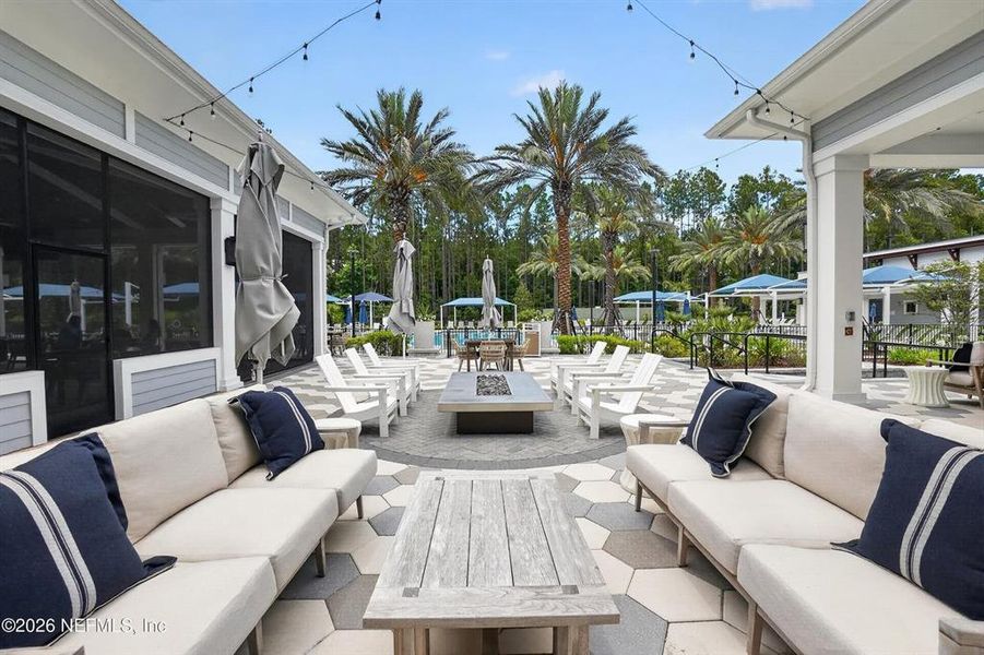 Exterior details and patio area of a home in Del Webb Wildlight, Wildlight (Image 25).