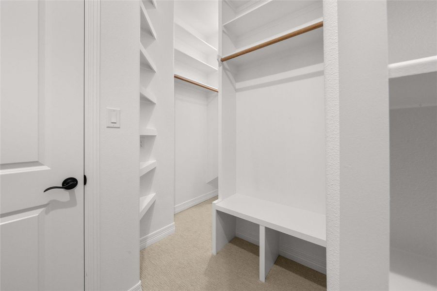 Ample shelving and hanging space in this well-appointed, ready-to-organize closet. Ample shelving and hanging space in this well-appointed, ready-to-organize closet.