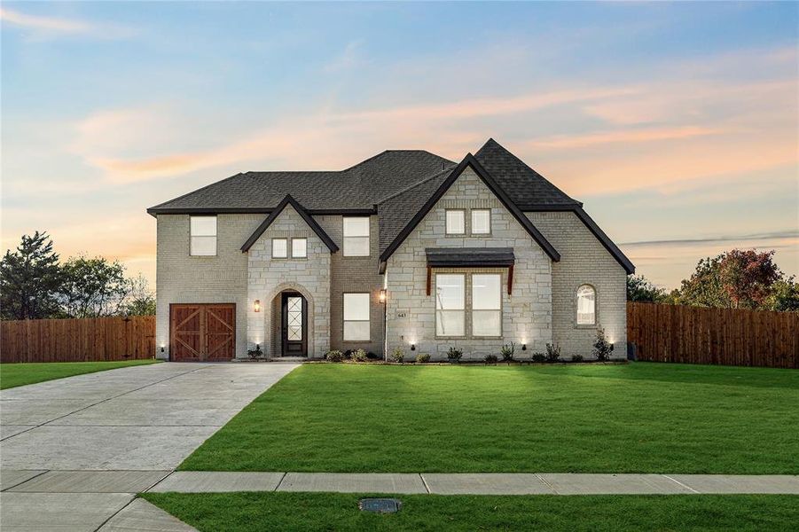 Front exterior of a new home in Crystal Lake Estates, Red Oak, TX, highlighting curb appeal (Image 18). Front exterior of a new home in Crystal Lake Estates, Red Oak, TX, highlighting curb appeal (Image 18).