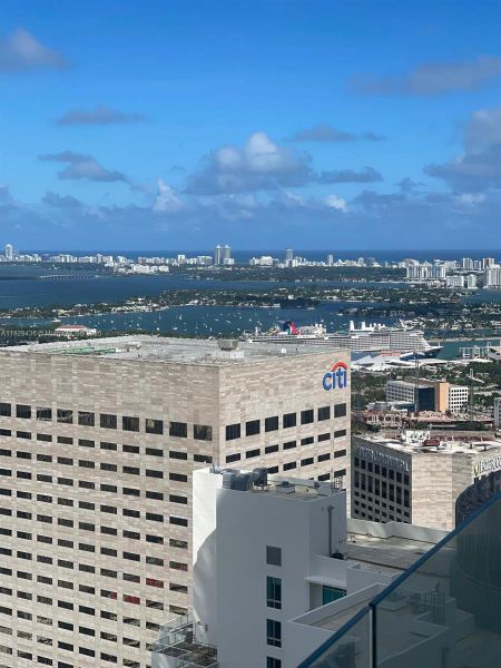 Front exterior of a new home in Aston Martin Residences, Miami, FL, highlighting curb appeal (Image 2). Front exterior of a new home in Aston Martin Residences, Miami, FL, highlighting curb appeal (Image 2).