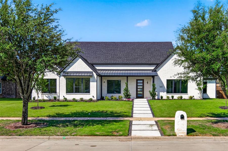 Front exterior of a new home in , Forney, TX, highlighting curb appeal (Image 26).