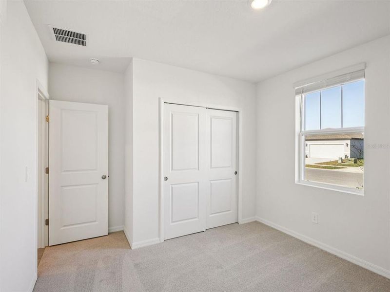 Spacious, unfurnished interior of a new home in Oakfield Trails - Classic Series, Parrish (Image 14).