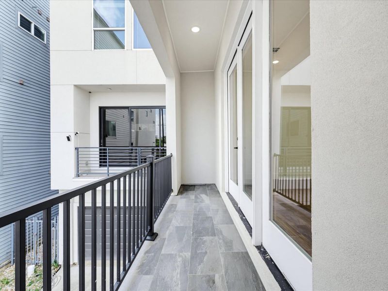 Exterior details and patio area of a home in , Houston (Image 4).
