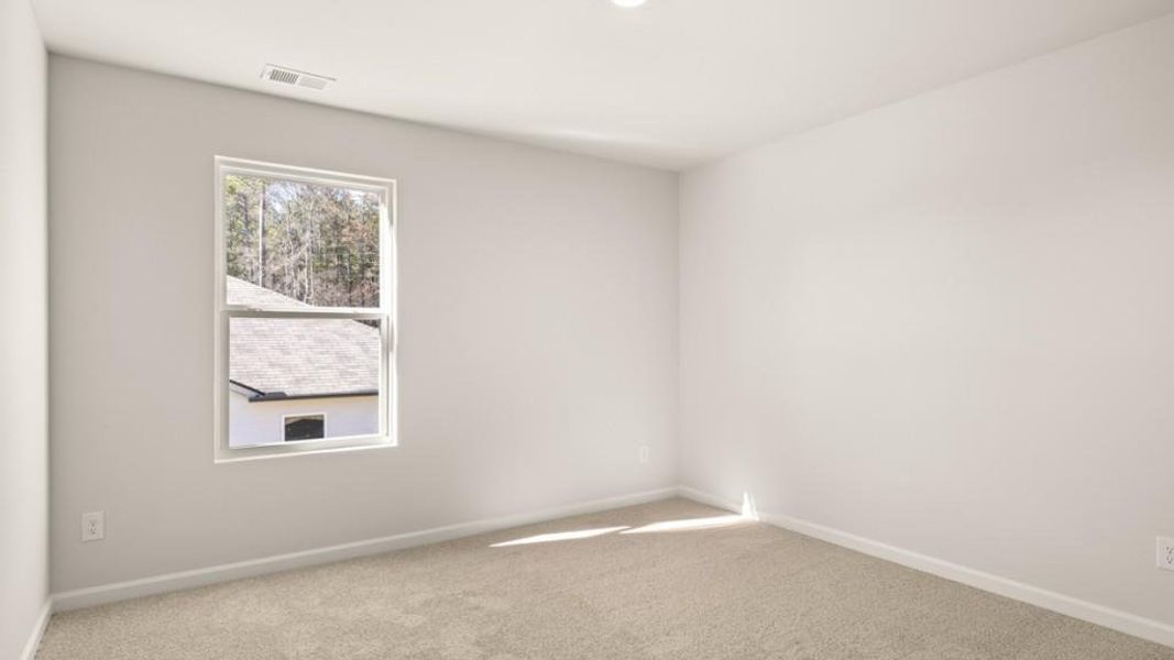 Spacious, unfurnished interior of a new home in Northwoods at Mirror Lake, Villa Rica (Image 20).
