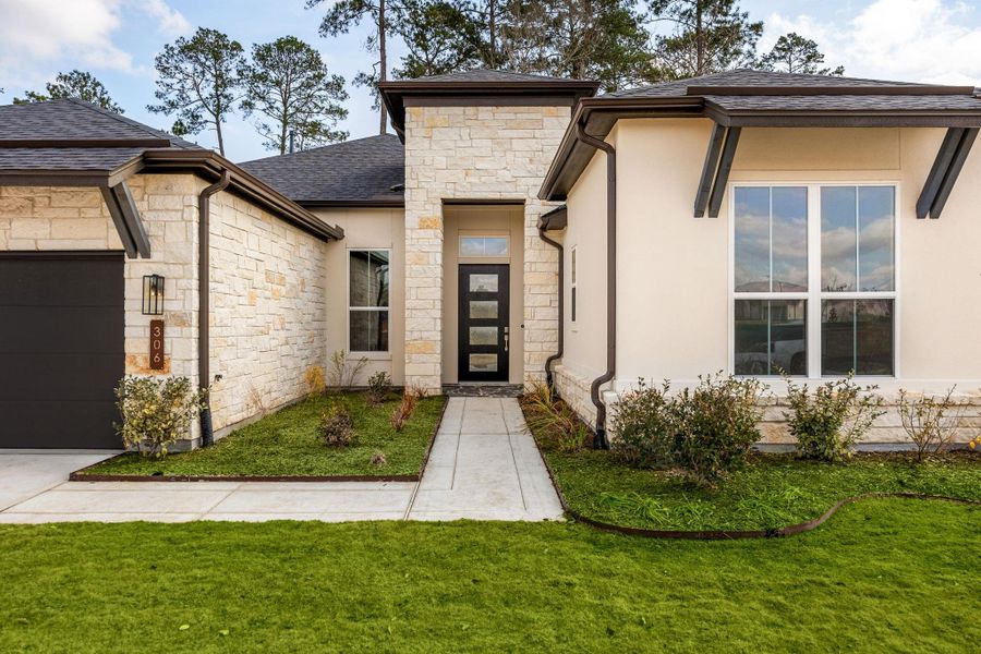 Exterior details and patio area of a home in Audubon 60’s, Magnolia (Image 23).