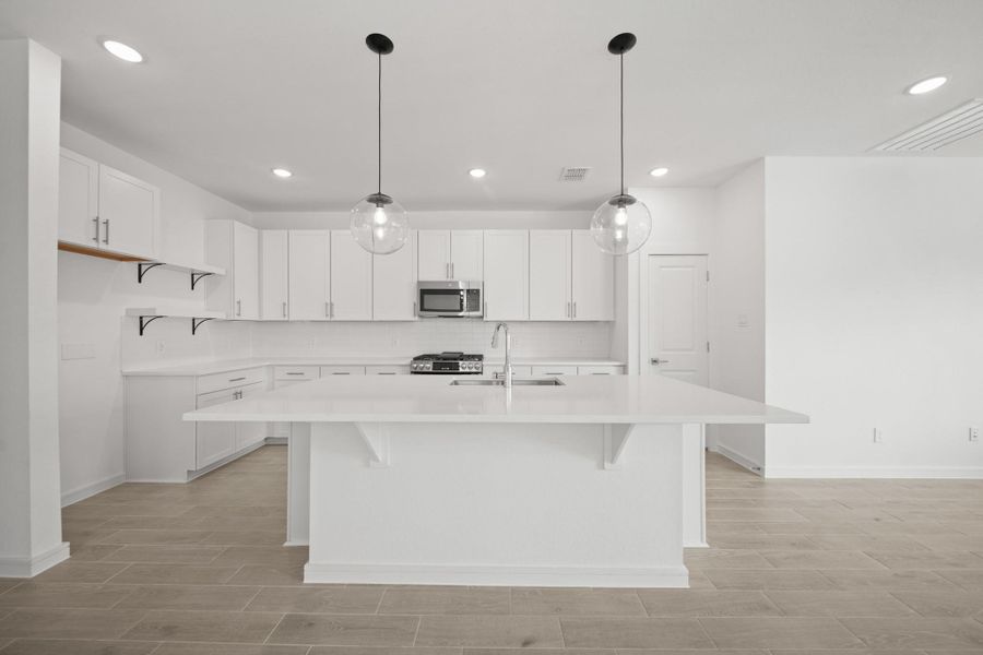 Gourmet island kitchen (*Photo not of actual home and used for illustration purposes only.)