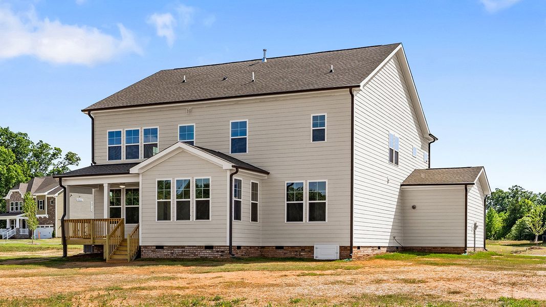 Exterior details and patio area of a home in Lilah Grove, Summerfield (Image 24).