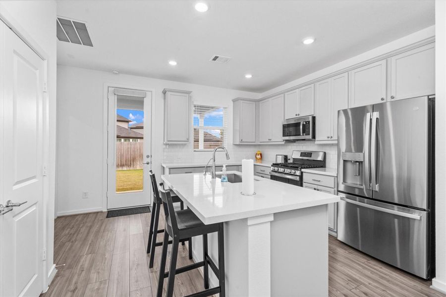 Furnished interior view inside a new home in Mason Woods, Cypress (Image 8).